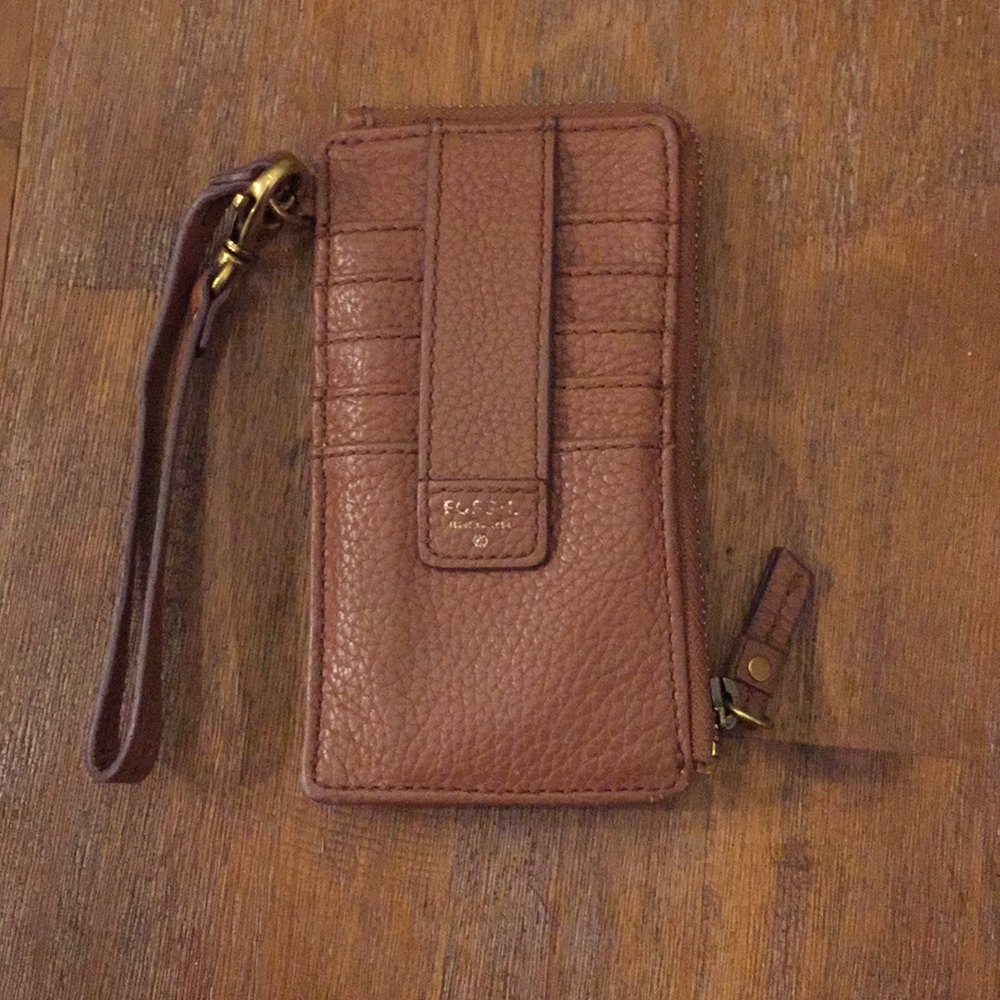 Brown leather fossil wristlet with removable strap